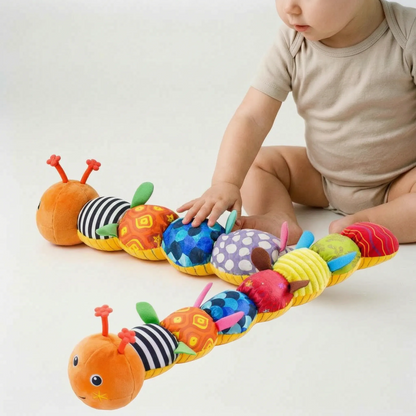 Babyrammelaar - Muzikale Sensorische Wormknuffel